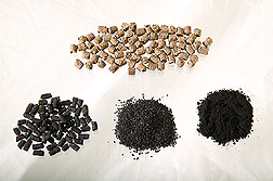 Photo: Series of samples illustrating poultry manure pellets, activated carbon pellets, granular activated carbon and powdered activated carbon. Link to photo information