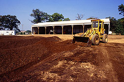 Photo: Composting facility with front end loader. 